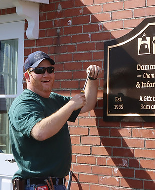 Owner hanging sign