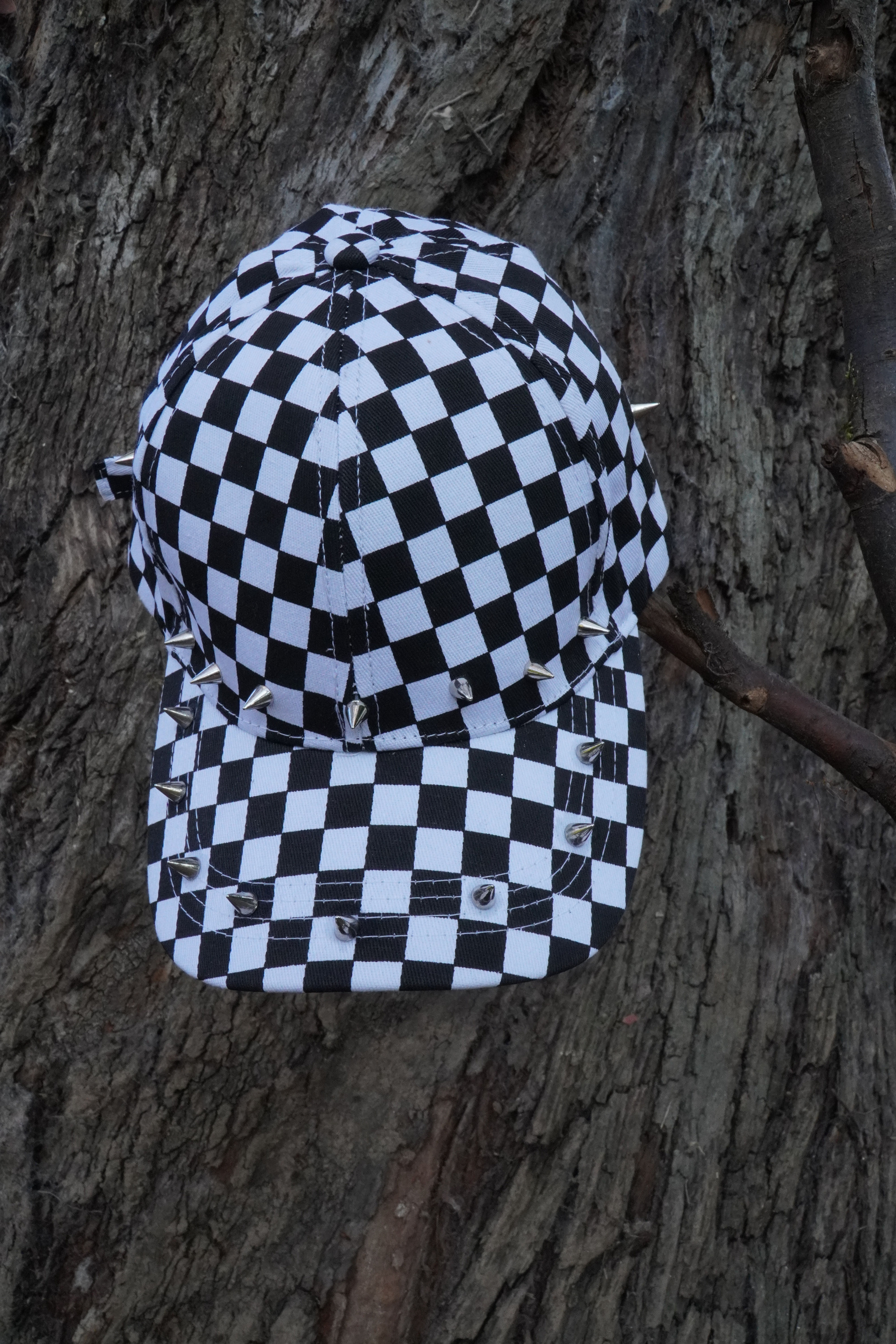 Black & white checkered baseball cap with studs