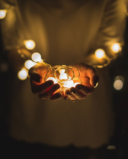 Hands Holding Lights