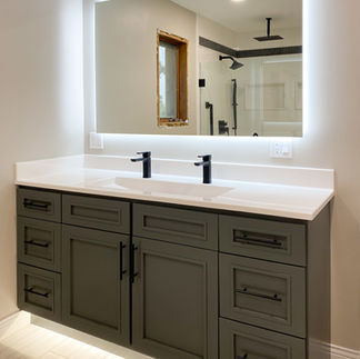 Modern vanity and sleek lighted mirror