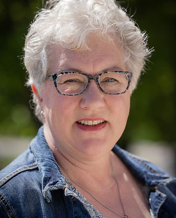 Headshot of St. Matthew's staff member Sara Belisle.