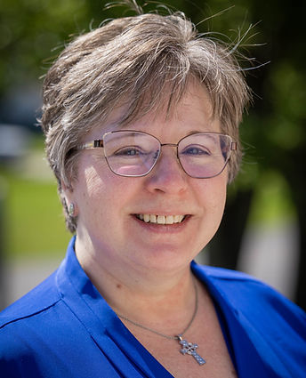 Headshot of St. Matthew's staff member Heidi Kauffman.