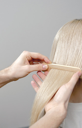 Combing Blond Hair_edited_edited.jpg