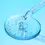Miniaturbild: Nahaufnahme der tropfenden Pipette mit gelartiger Textur des Serums