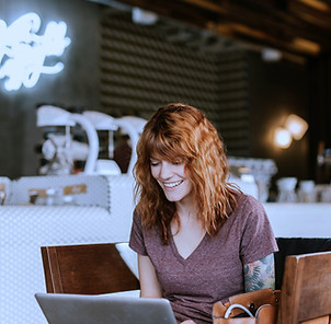 Tattooed woman with laptop_edited_edited