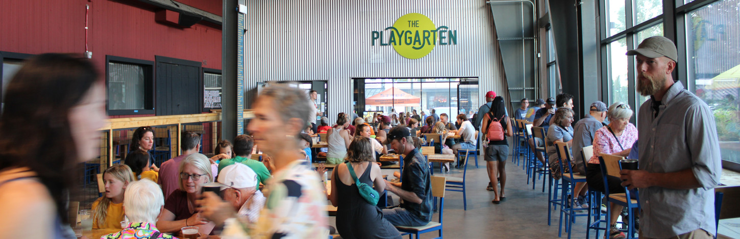 Lively indoor gathering at The Playgarten and Old Dillon Inn