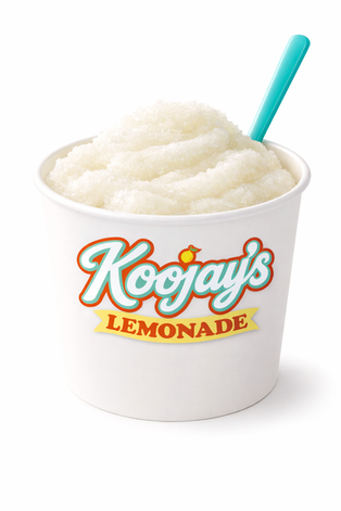 Our Soft Frozen Lemonade recipe served with a spoon.