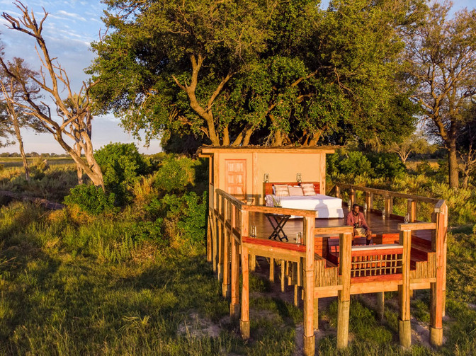 Sleep under the stars at Camp Okavango