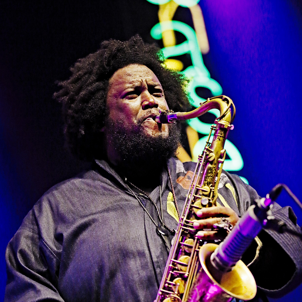 American jazz saxophonist, composer, and bandleader Kamasi Washington is renowned for his innovative contributions to contemporary jazz. His unique blend of jazz, funk, classical, and hip-hop influences may be heard on several of his solo recordings