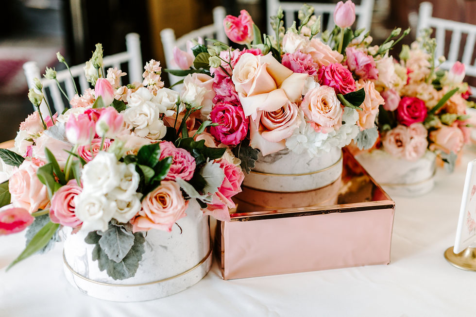 Garden roses, eucalyptus, tulips floral design centerpieces