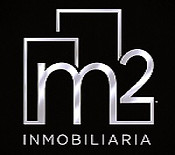 Logotipo M2 Inmobiliaria: edificios y texto | M2 Inmobiliaria