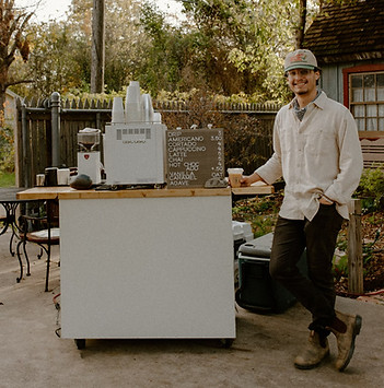 Barista Serving at the Coffee Cart