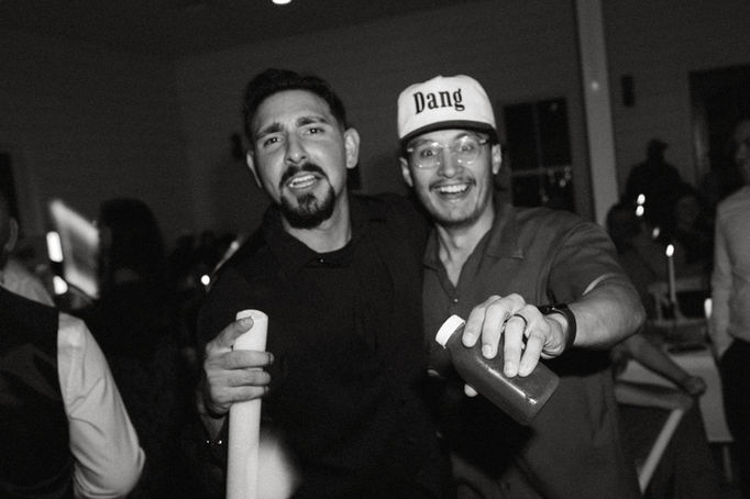 Groom and Owner on the dance floor of groom's wedding