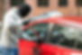 Thief breaking in a Car