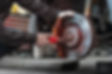 worker-repairing-car-side-view.jpg