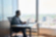 indian-latin-businessman-sitting-in-office-at-desk-2021-09-03-03-06-47-utc.jpg