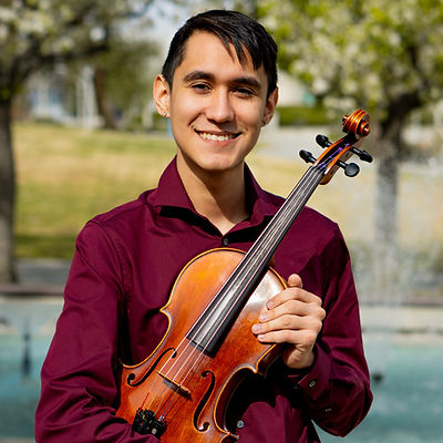 Professional headshot of Gabriel Knights-Herrera with his viola.