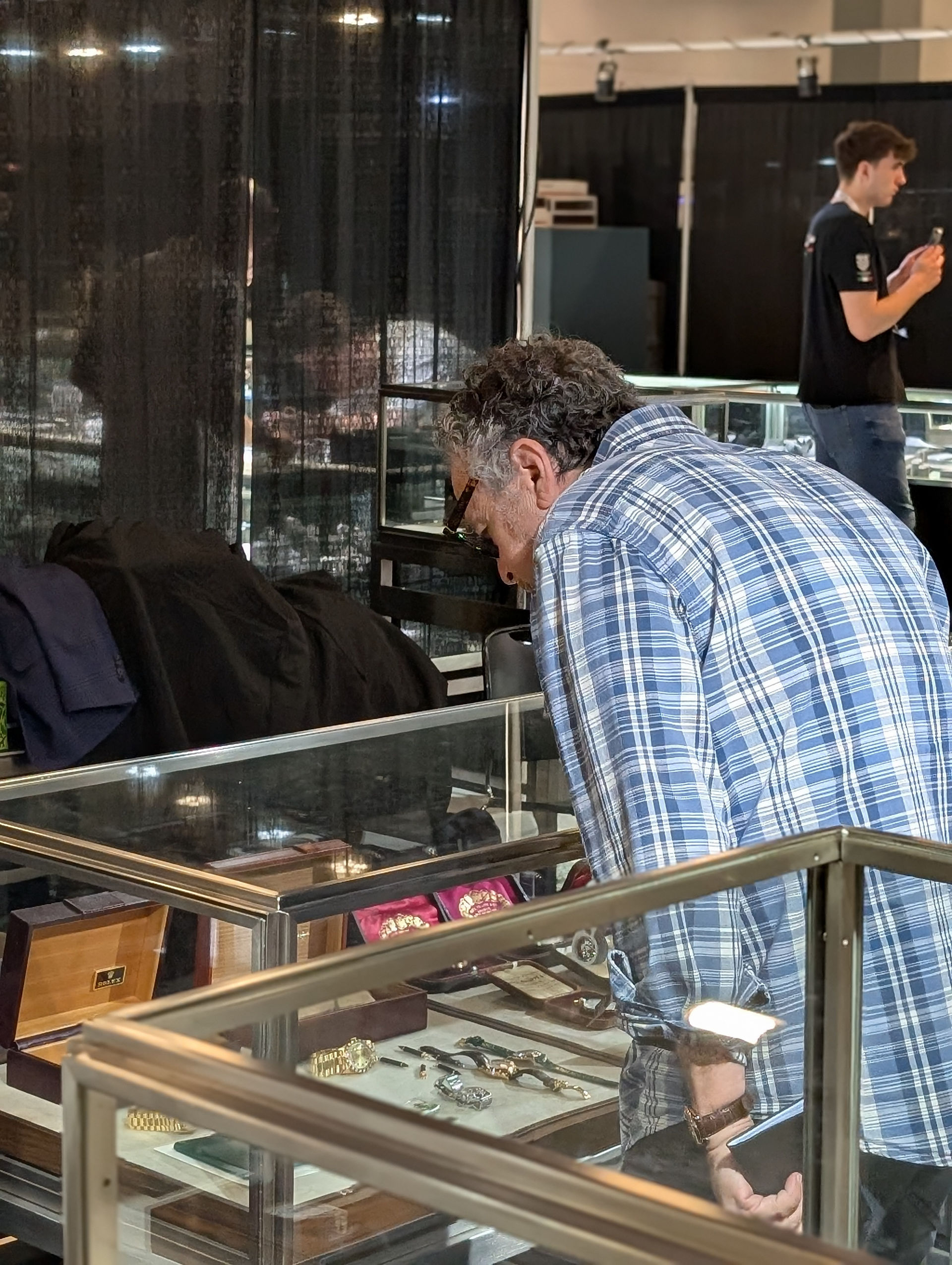 Luxe Auctioneers by Peter Planes booth inspected by Matthew Bain