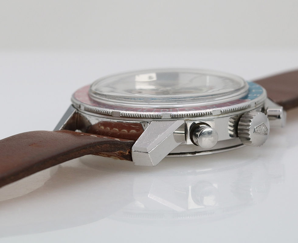 Side of 1970 Vintage Heuer Autavia GMT Chronograph Wrist Watch Ref. 2446C With Mark ii Dial