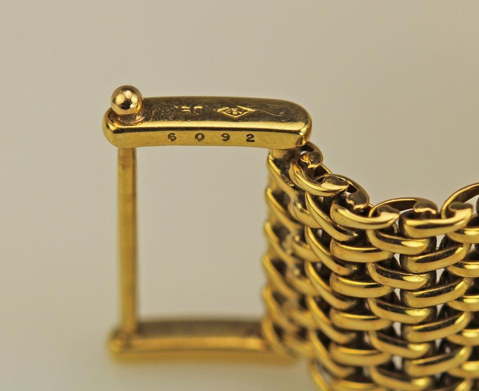 1940's Cartier Tank Chinoise Gold Wrist Watch On Gold Bracelet Displaying Hallmarks & Cartier Numbers On Bracelet