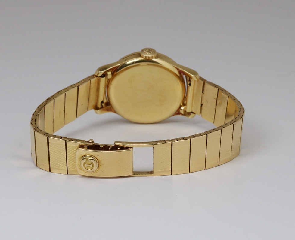 Back Of 1950's Patek Philippe Calatrava Ladies Gold Watch Ref. 3148 With Gold Gubelin Bracelet