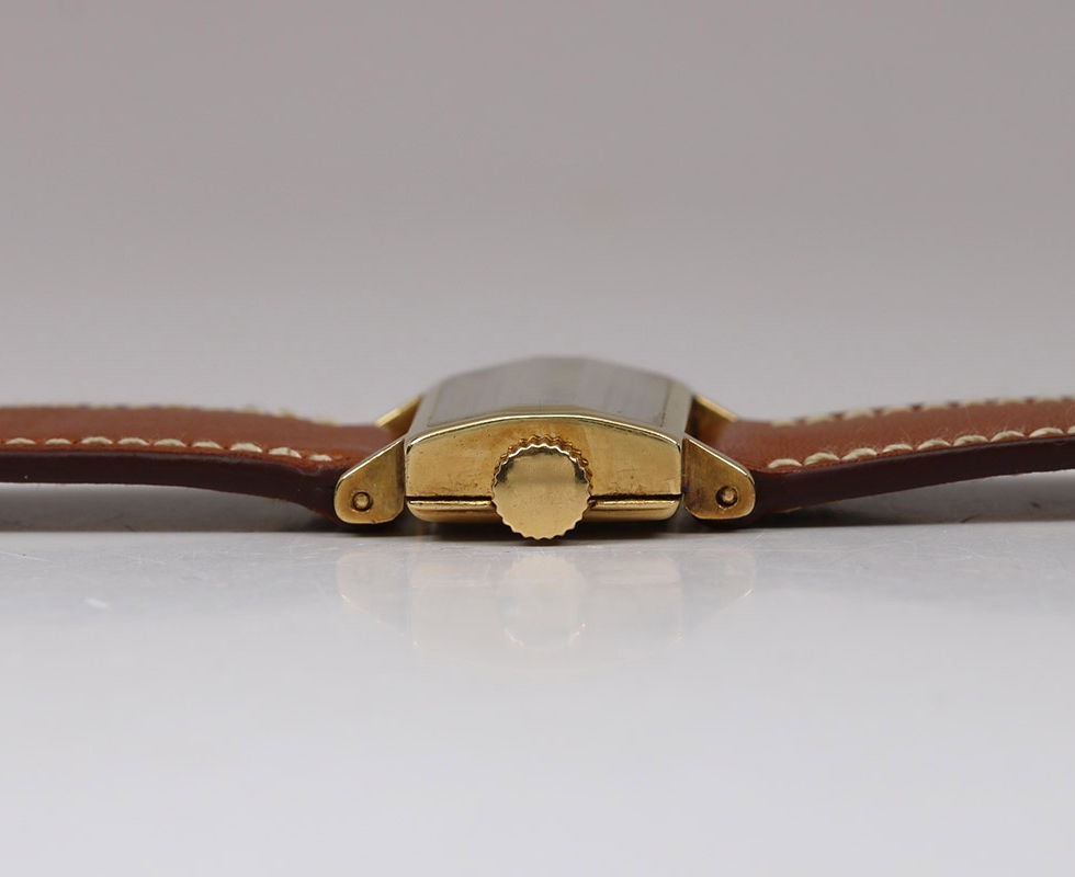 Crown Side Of 1963 Patek Philippe Gold Rectangular 'Drivers' Watch Ref. 139
