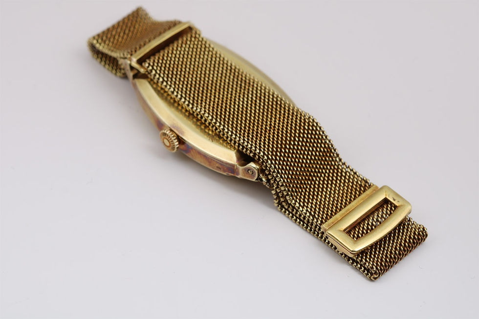 Back Of 1940 Patek Philippe 'Armadillo' Vintage Gold Wrist Watch With Gold Mesh Bracelet