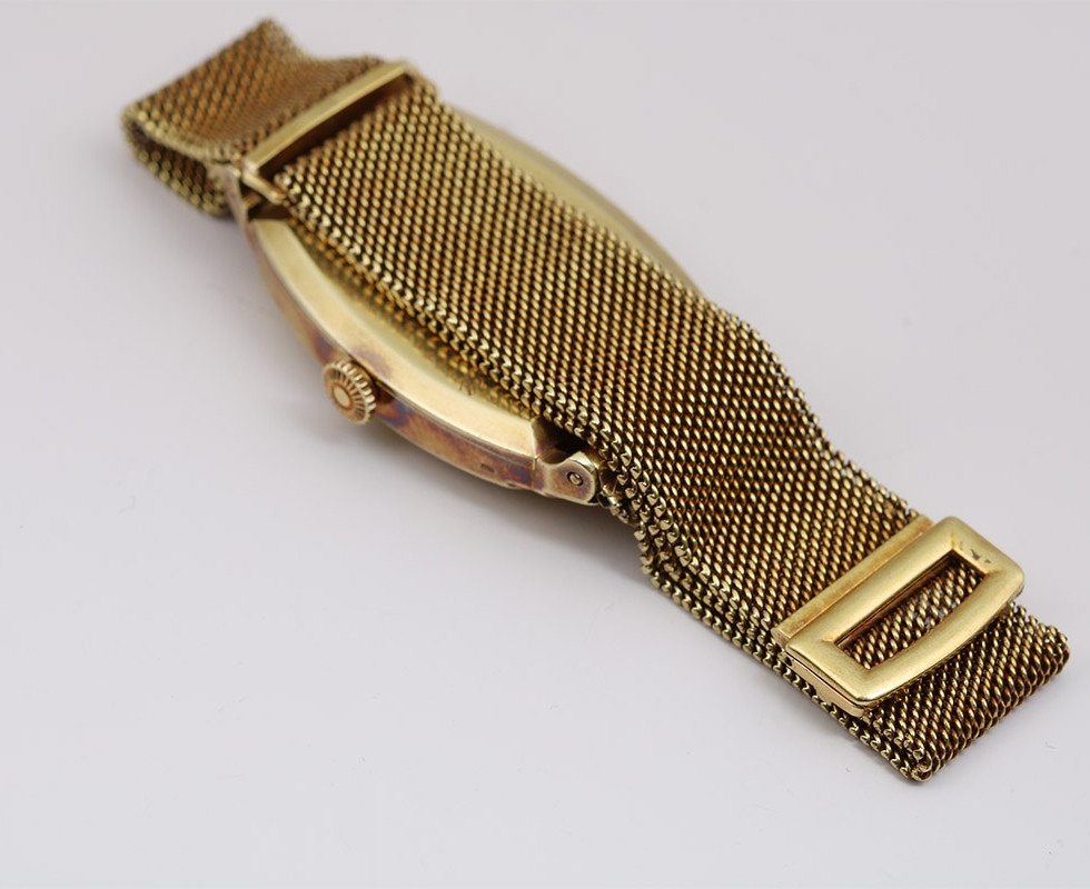 Back Of 1940 Patek Philippe 'Armadillo' Vintage Gold Wrist Watch With Gold Mesh Bracelet