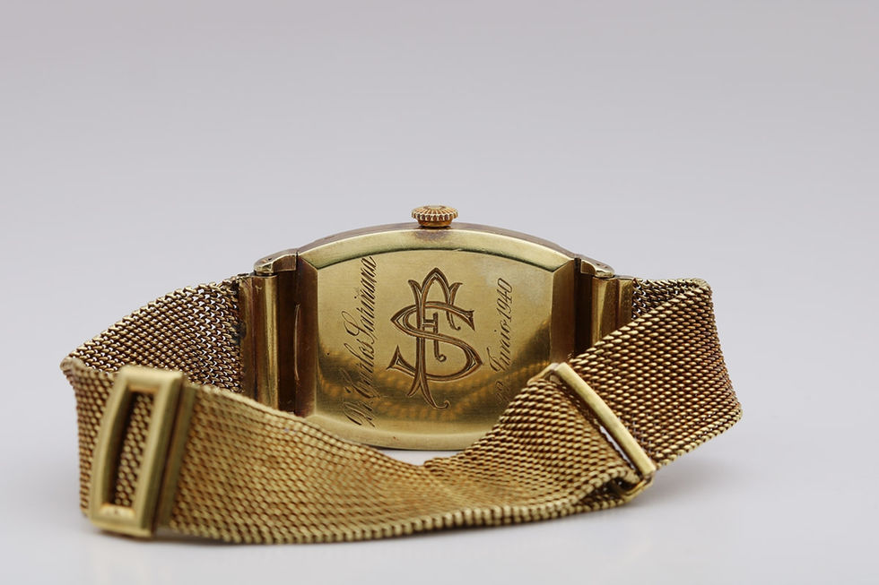 Back Showing Case Back Of 1940 Patek Philippe 'Armadillo' Vintage Gold Wrist Watch With Gold Mesh Bracelet