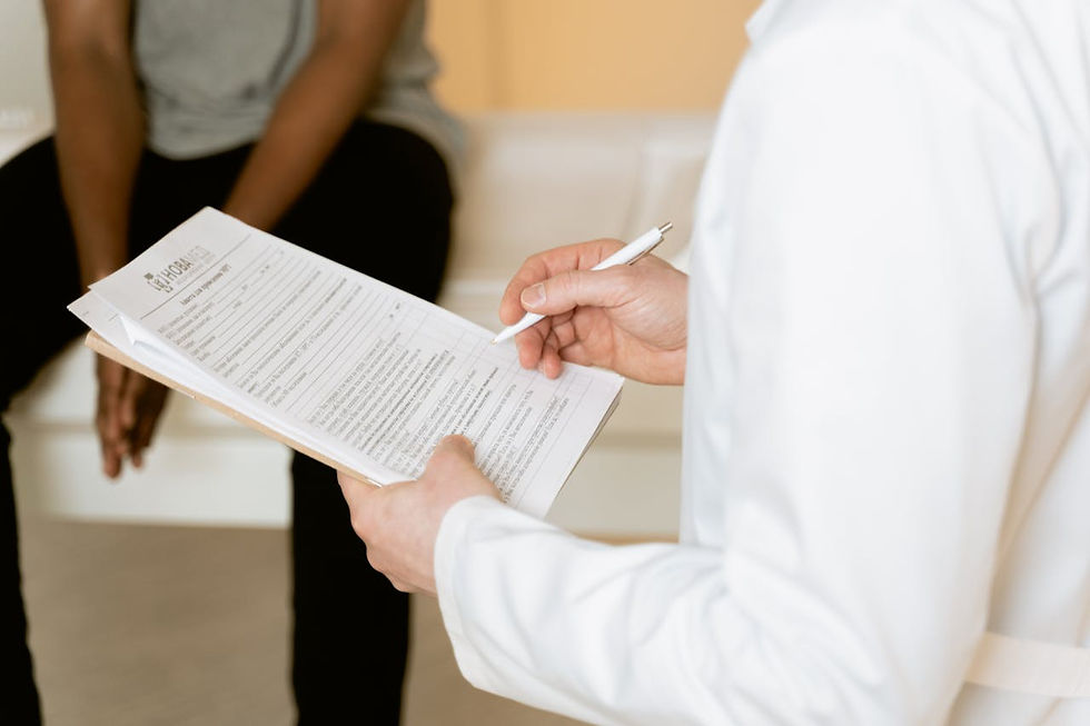 Doctor holding paperwork and reviewing data for a disabled veteran