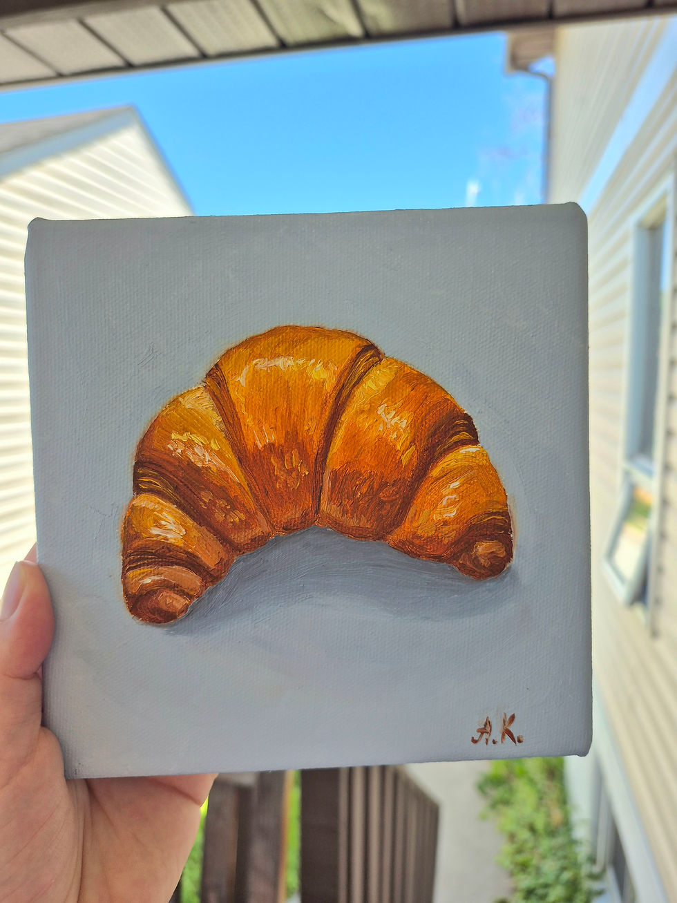 Thumbnail: Croissant oil painting in hand