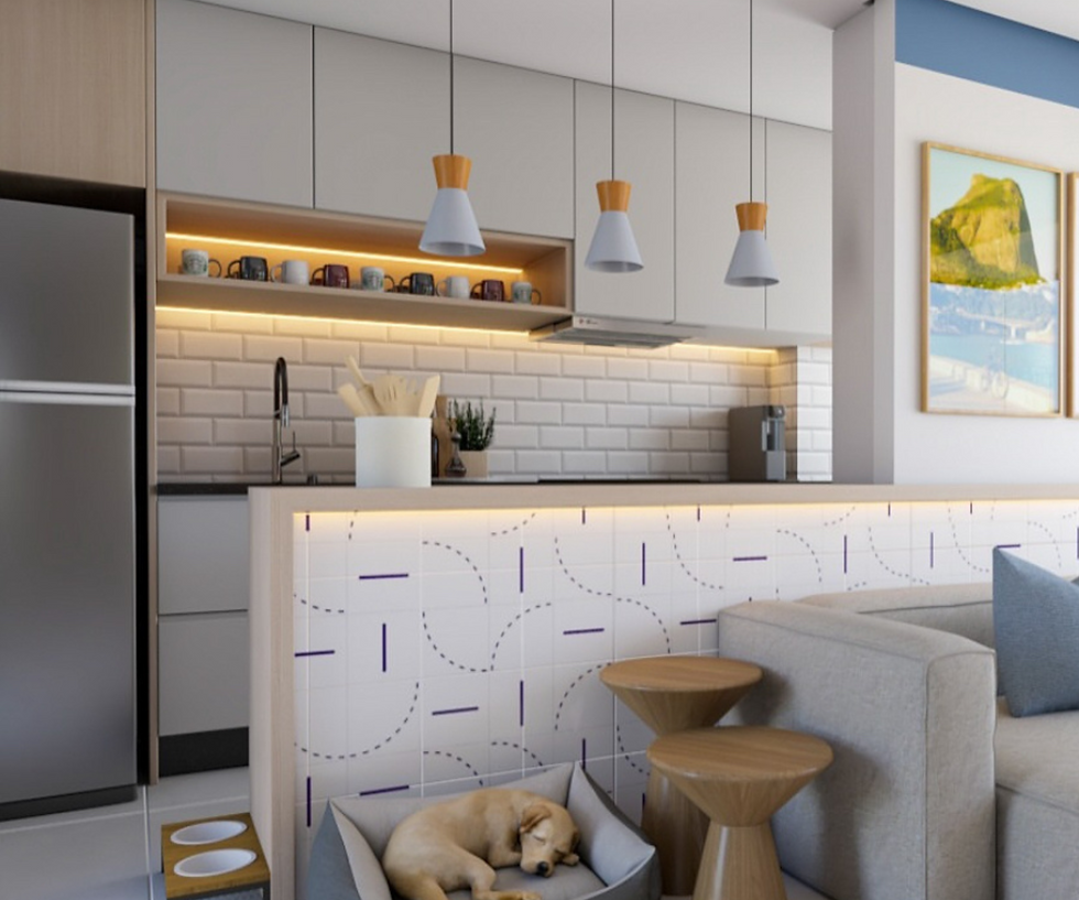 Cozinha e sala integradas em um espaço clean e sofisticado, com marcenaria clara, iluminação decorativa e bancada funcional.