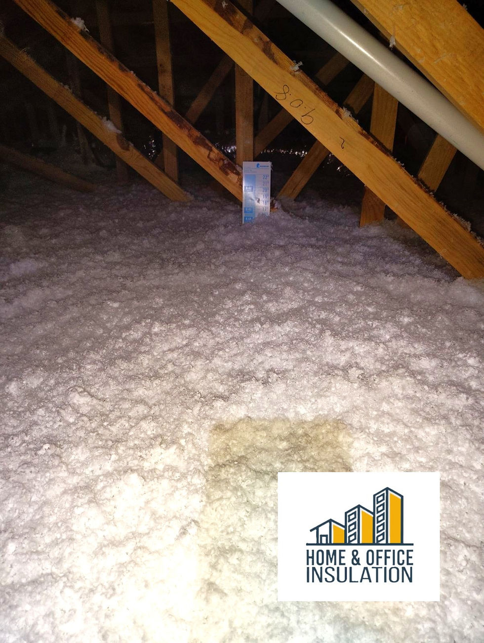 Eye-level view of attic insulation installation in a Texas home