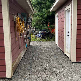 Clean gravel surface around shop buildings