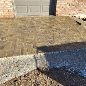 brick paver patio on house
