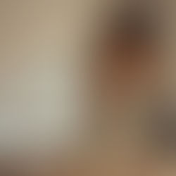 A distressed woman is blurred in the background, highlighting a scale of justice in focus on the table, symbolizing the emotional weight of decision-making and judgement.