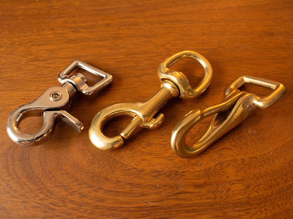 Several styles of clips shown in stainless steel and solid brass.