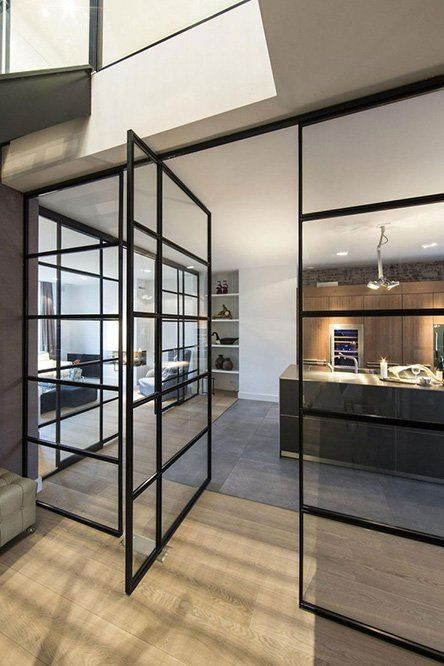 An elegant steel industrial style pivot door