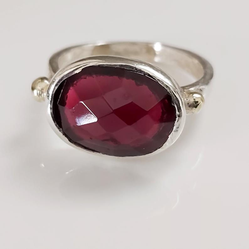 Thumbnail: Handmade Sterling Silver Garnet Ring: Oval Red Gemstone, Gold Accent