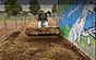 loading bulk manure with bobcat loader