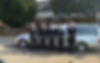 Claridge Funeral Service team with one of many available cars.