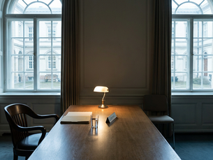 desk with table desk light and single chair