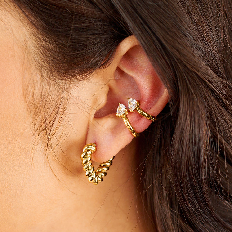 Thumbnail: Gold Twisted Triangle Hoops