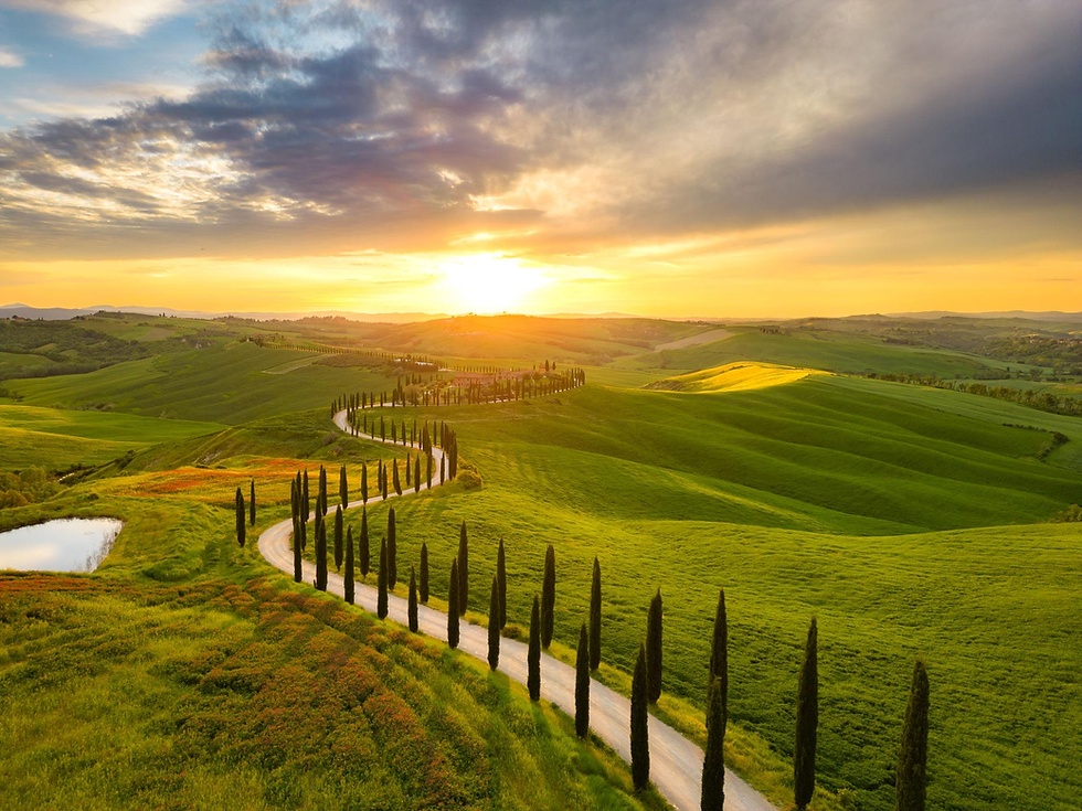 Val d'Orcia is universally praised by travelers as a postcard-perfect Tuscan landscape, celebrated for its rolling golden hills, cypress-lined driveways, and medieval villages.