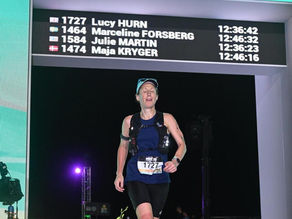 Coach Lucy hurn crosses the Ironman World Championships finish line