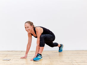 S&C coach Lucy Hurn doing  mobility exercise