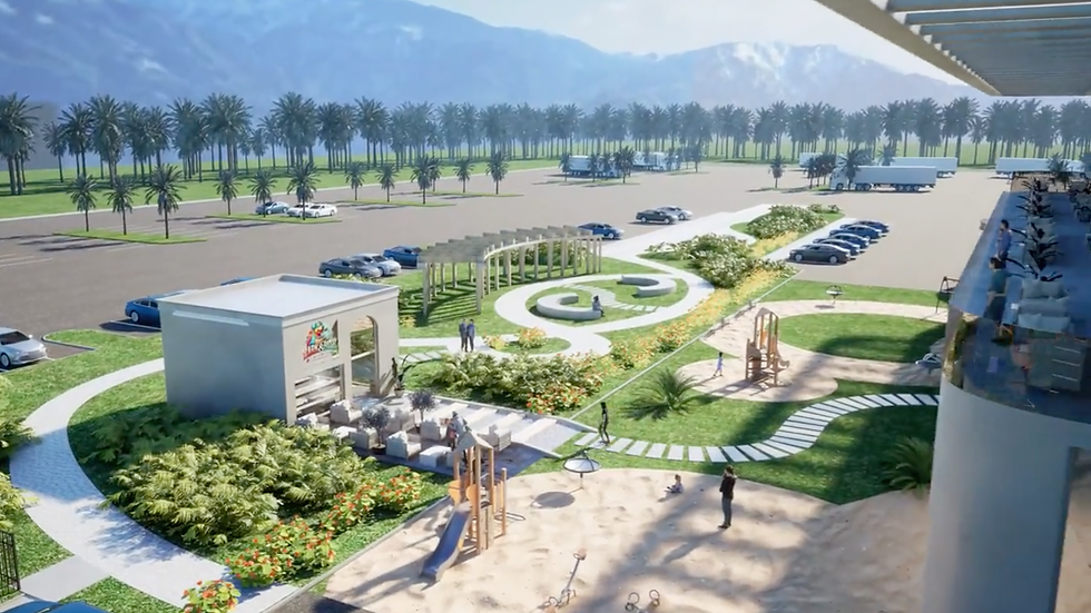 Overview from the rooftop of Pitpalazzo travel center looking out to the children's playground, Pup Bistro Lounge, and dog park, with mountains in the background and landscaped greenery throughout.