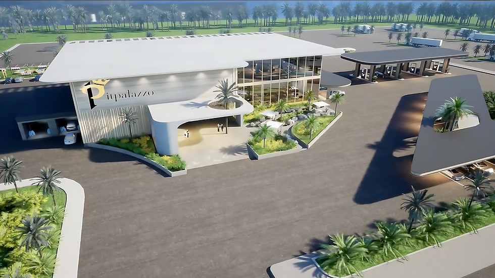 Pitpalzzo Travel Center main building, EV charging stations, parking spaces, fuel station, modern architecture, surrounding landscaped greenery.