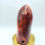 Thumbnail: Large Carnelian Freeform With Quartz Crystal