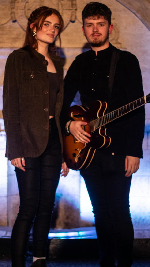 William and Georgia in their band, The Family